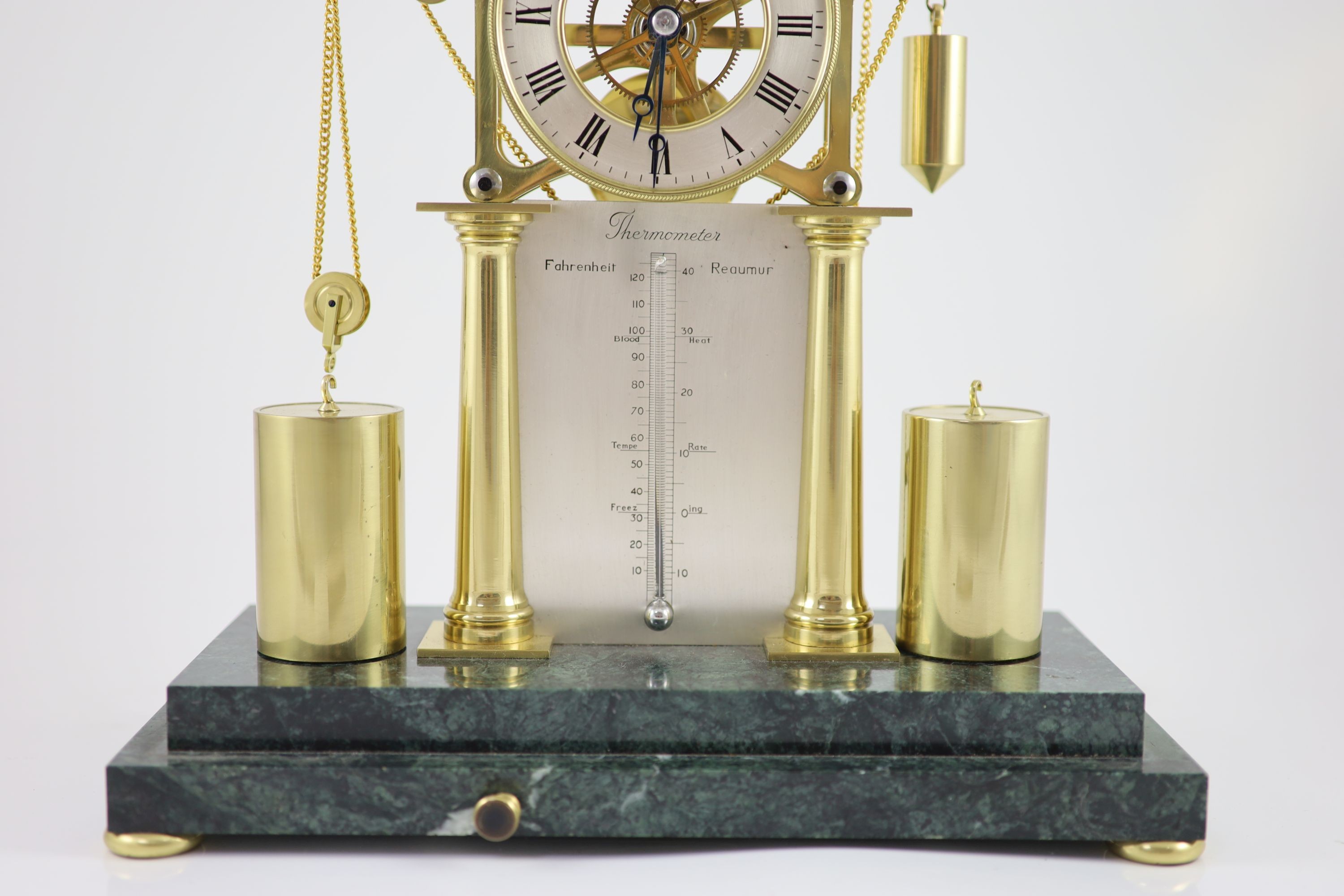 An F.H.Whitlock Empire style brass skeleton clock H 54cm. W 35cm. D 16cm.